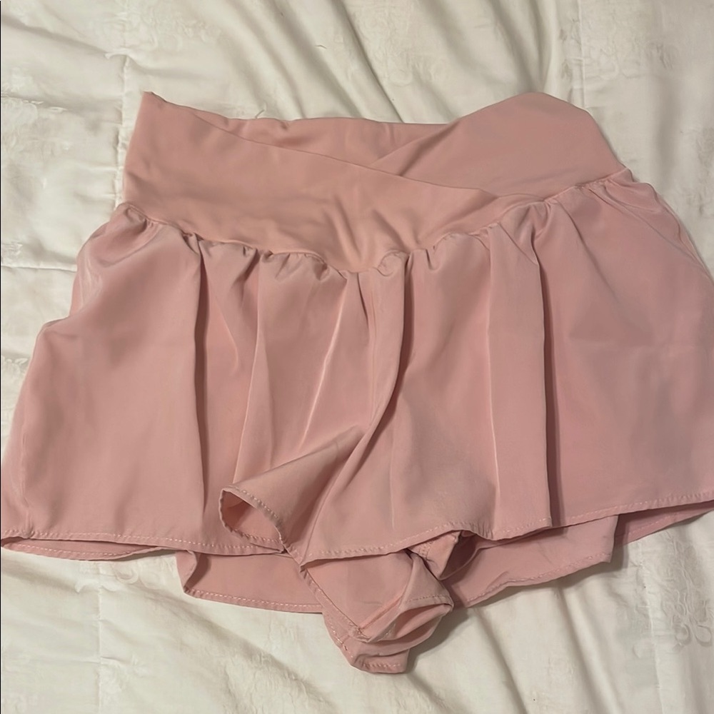 Pink crossover athletic shorts